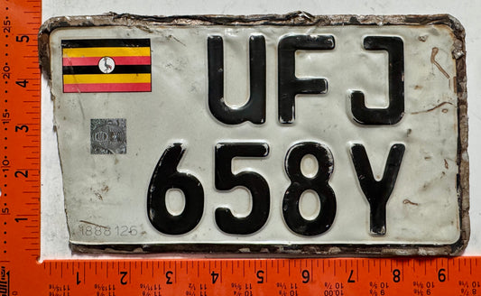 1999 series Uganda #UFJ/658Y Motorcycle License Plate